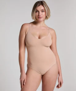Nahtlos betonender Body mit hohem Beinausschnitt - Beige